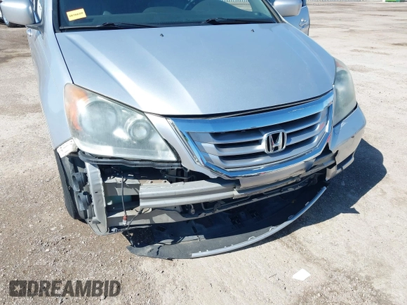2010 Honda Odyssey Touring with VIN 5FNRL3H97AB015472, listed as a IAAI auction lot 41763680 with 144,309 mi miles. Bid and sale history available at carsss.com. Image 6.