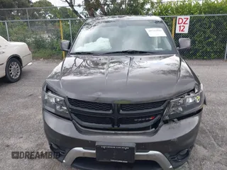 2020 Dodge Journey Crossroad with VIN 3C4PDCGB0LT270042, listed as a IAAI auction lot 40521806 with 102,934 mi miles and . Bid and sale history available at carsss.com. Image 12.