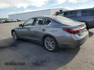 2019 Infiniti Q50 Luxe with VIN JN1EV7AR7KM557533, listed as a Copart auction lot 52172225 with 97,270 mi miles and Salvage title. Bid and sale history available at DreamBid. Image 2.