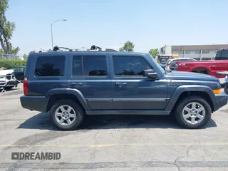 2007 Jeep Commander Sport with VIN 1J8HH48KX7C548033, listed as a IAAI auction lot 42555217 with 213,236 mi miles and . Bid and sale history available at DreamBid. Image 13.