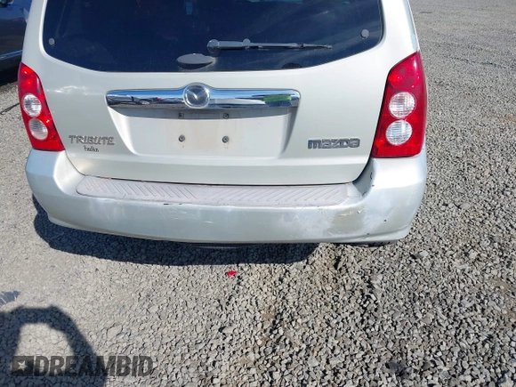 2005 Mazda Tribute S with VIN 4F2CZ96105KM04032, listed as a IAAI auction lot 42157429 with 199,704 mi miles and . Bid and sale history available at carsss.com. Image 6.