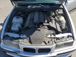 1999 BMW 3 Series 328i with VIN WBABK733XXET68116, listed as a Copart auction lot 66958525 with 116,302 mi miles and Salvage title. Bid and sale history available at DreamBid. Image 11.