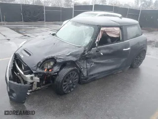 2014 MINI Cooper Hardtop S with VIN WMWXM7C56ET970635, listed as a IAAI auction lot 41553560 with NaN miles. Bid and sale history available at carsss.com. Image 2.