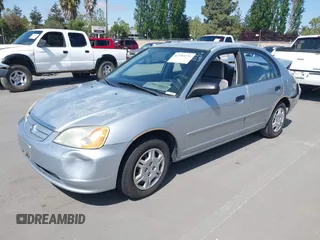 2001 Honda Civic LX with VIN 2HGES16591H619719, listed as a IAAI auction lot 42183571 with 294,983 mi miles. Bid and sale history available at carsss.com. Image 2.