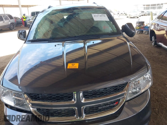 2019 Dodge Journey SE z VIN 3C4PDCBG9KT798938, wystawiony jako IAAI lot #42174970 z przebiegiem Nie podano mil oraz . Historia ofert i sprzedaży dostępna na DreamBid. Obrazek 7.