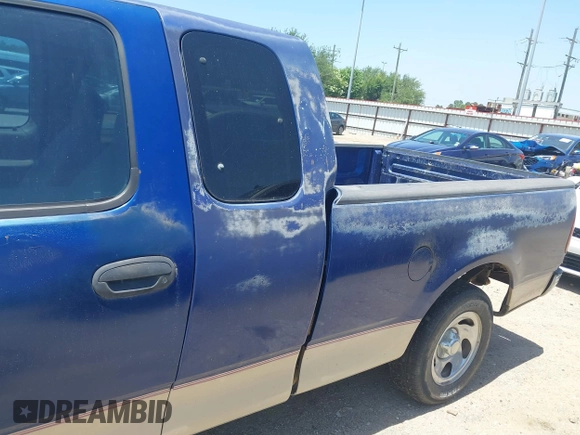 1998 Ford F-150 with VIN 1FTZX1725WKB57987, listed as a IAAI auction lot 42854030 with 210,471 mi miles and . Bid and sale history available at DreamBid. Image 6.