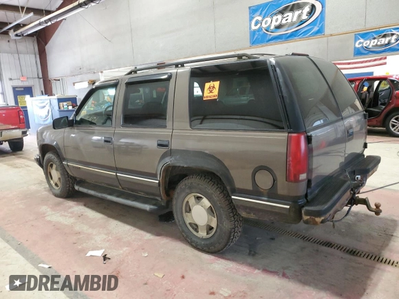 1998 Chevrolet Tahoe z VIN 1GNEK13R0WJ302401, wystawiony jako Copart lot #47196925 z przebiegiem 202 595 mil mil oraz Szkoda całkowita • Salvage title. Historia ofert i sprzedaży dostępna na DreamBid. Obrazek 2.