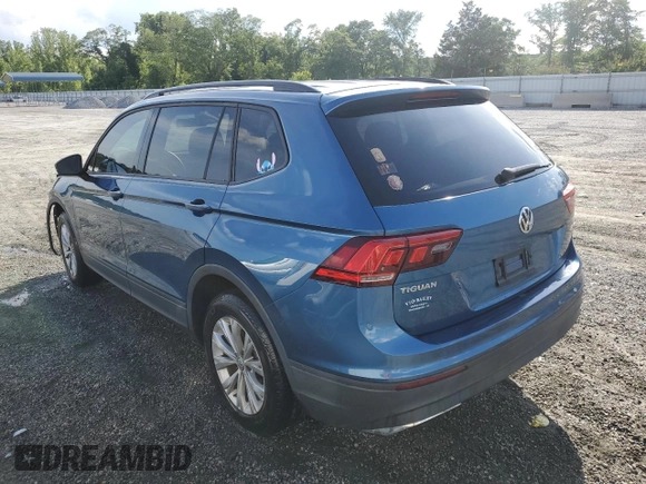 2018 Volkswagen Tiguan S with VIN 3VV0B7AX2JM019924, listed as a Copart auction lot 56138375 with 76,798 mi miles and Salvage title. Bid and sale history available at DreamBid. Image 2.