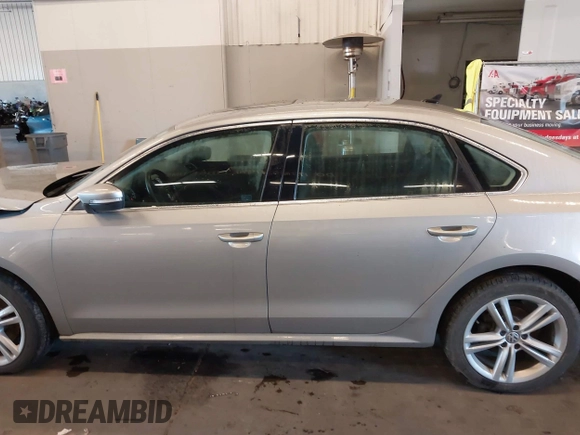 2014 Volkswagen Passat SE z VIN 1VWBN7A36EC064753, wystawiony jako IAAI lot #41221736 z przebiegiem 106 105 mil mil oraz . Historia ofert i sprzedaży dostępna na DreamBid. Obrazek 14.