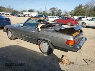 1988 Mercedes-Benz 560 Series 560SL with VIN WDBBA48D9JA082731, listed as a Copart auction lot 84756764 with 156,731 mi miles and Clean Title. Bid and sale history available at carsss.com. Image 2.