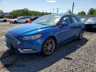 2017 Ford Fusion SE z VIN 3FA6P0T9XHR303675, wystawiony jako Copart lot #57134985 z przebiegiem 130 964 mil mil oraz Tytuł czysty. Historia ofert i sprzedaży dostępna na DreamBid. Obrazek 1.