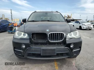 2012 BMW X5 35i z VIN 5UXZV4C51CL989449, wystawiony jako Copart lot #56762095 z przebiegiem 112 576 mil mil oraz Szkoda całkowita • Salvage title. Historia ofert i sprzedaży dostępna na DreamBid. Obrazek 5.