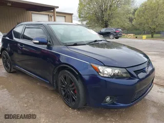 2011 Scion tC with VIN JTKJF5C71B3006683, listed as a IAAI auction lot 41843483 with 270,949 mi miles. Bid and sale history available at carsss.com. Image 1.
