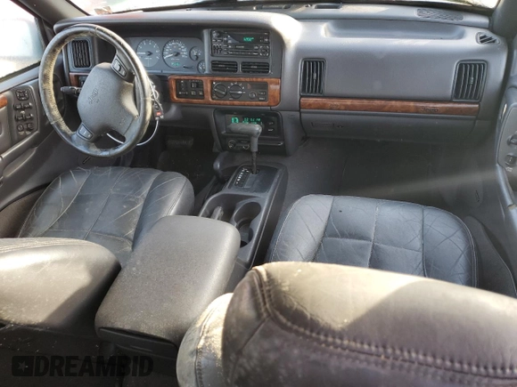 1998 Jeep Grand Cherokee Limited with VIN 1J4GZ78S0WC138917, listed as a Copart auction lot 86223974 with 152,482 mi miles and Clean title. Bid and sale history available at DreamBid. Image 8.