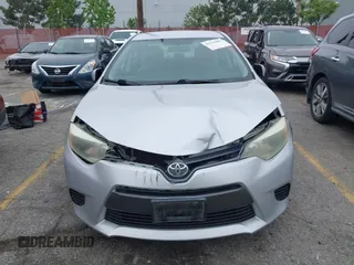 2015 Toyota Corolla L with VIN 5YFBURHE6FP259379, listed as a IAAI auction lot 42153082 with 185,294 mi miles and . Bid and sale history available at DreamBid. Image 12.