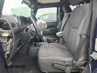 2013 Jeep Wrangler Unlimited Sport z VIN 1C4BJWDG9DL509685, wystawiony jako Copart lot #58521415 z przebiegiem 254 452 mil mil oraz Szkoda całkowita • Salvage title. Historia ofert i sprzedaży dostępna na DreamBid. Obrazek 7.