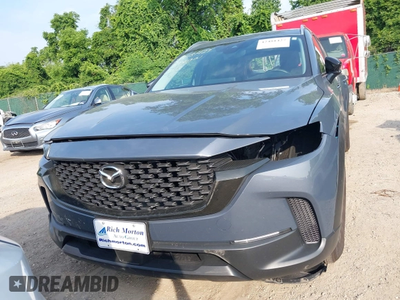 2024 Mazda CX-50 S Premium z VIN 7MMVABDM7RN231991, wystawiony jako IAAI lot #42481427 z przebiegiem 7 843 mil mil oraz . Historia ofert i sprzedaży dostępna na DreamBid. Obrazek 19.