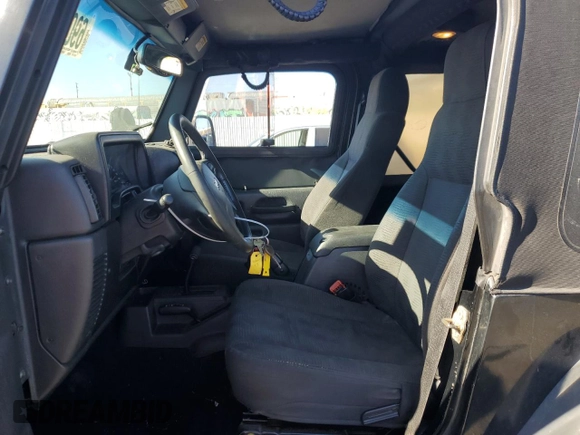 2005 Jeep Wrangler Rubicon with VIN 1J4FA69SX5P343826, listed as a Copart auction lot 69074374 with 179,610 mi miles and Salvage Title. Bid and sale history available at carsss.com. Image 7.