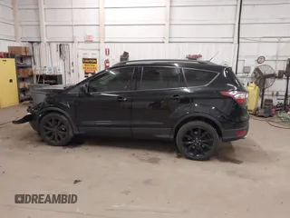 2017 Ford Escape SE with VIN 1FMCU9G98HUE31244, listed as a IAAI auction lot 40985971 with 88,067 mi miles. Bid and sale history available at carsss.com. Image 14.