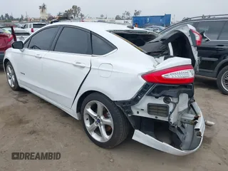 2014 Ford Fusion SE Hybrid with VIN 3FA6P0LU0ER189444, listed as a IAAI auction lot 42291020 with 187,148 mi miles and . Bid and sale history available at DreamBid. Image 3.