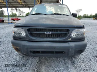 2000 Ford Explorer Sport with VIN 1FMYU60E8YUB03494, listed as a Copart auction lot 59266395 with 210,925 mi miles and Salvage title. Bid and sale history available at DreamBid. Image 5.