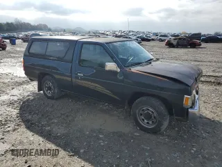 1994 Nissan Frontier with VIN 1N6SD11S4RC405080, listed as a Copart auction lot 82565904 with 154,400 mi miles and Salvage title. Bid and sale history available at DreamBid. Image 4.