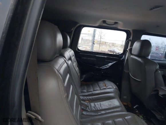 2003 Hummer H2 with VIN 5GRGN23UX3H106356, listed as a IAAI auction lot 41185603 with 1 mi miles. Bid and sale history available at carsss.com. Image 8.
