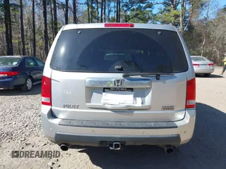 2010 Honda Pilot Touring with VIN 5FNYF4H91AB020868, listed as a IAAI auction lot 41783104 with 298,022 mi miles and . Bid and sale history available at carsss.com. Image 16.