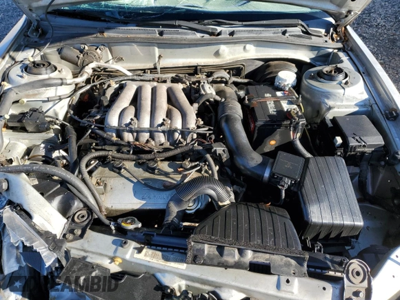 2002 Mitsubishi Galant ES z VIN 4A3AA46H42E060744, wystawiony jako Copart lot #37732694 z przebiegiem 173 507 mil mil oraz Szkoda całkowita • Salvage title. Historia ofert i sprzedaży dostępna na DreamBid. Obrazek 11.