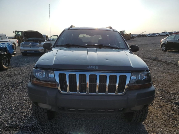 2002 Jeep Grand Cherokee Laredo with VIN 1J4GW48N32C180185, listed as a Copart auction lot 51988335 with 212,399 mi miles and Salvage Title. Bid and sale history available at carsss.com. Image 6.
