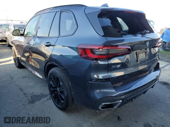 2022 BMW X5 xDrive45e with VIN 5UXTA6C04N9J66273, listed as a Copart auction lot 69163062 with 7,464 mi miles. Bid and sale history available at carsss.com. Image 2.