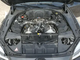 2016 BMW M6 z VIN WBS6E9C53GGF92689, wystawiony jako Copart lot #60226324 z przebiegiem Nie podano mil oraz Szkody całkowita. Historia ofert i sprzedaży dostępna na DreamBid. Obrazek 11.