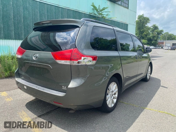 2011 Toyota Sienna XLE with VIN 5TDDK3DC3BS023855, listed as a Copart auction lot 65672825 with 280,540 mi miles and Clean title. Bid and sale history available at DreamBid. Image 4.