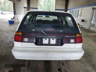1991 Toyota Camry z VIN JT2SV21W7M0380204, wystawiony jako Copart lot #72694404 z przebiegiem 242 162 mil mil oraz Szkoda całkowita • Salvage title. Historia ofert i sprzedaży dostępna na DreamBid. Obrazek 6.