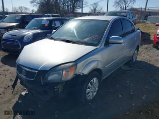 2011 Kia Rio LX with VIN KNADH4A38B6747739, listed as a IAAI auction lot 41431277 with 172966 miles. Bid and sale history available at carsss.com. Image 18.