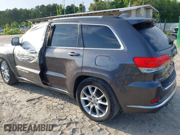 2015 Jeep Grand Cherokee Summit with VIN 1C4RJFJG0FC611768, listed as a IAAI auction lot 42468497 with 217,032 mi miles and . Bid and sale history available at DreamBid. Image 3.