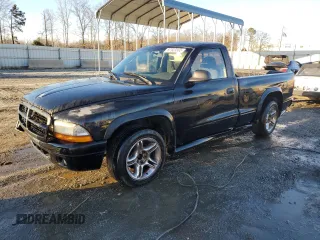 2003 Dodge Dakota z VIN 1D7FL76Z53S266631, wystawiony jako Copart lot #87503565 z przebiegiem 193 092 mil mil oraz Szkoda całkowita • Salvage title. Historia ofert i sprzedaży dostępna na DreamBid. Obrazek 1.