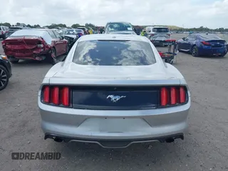 2016 Ford Mustang EcoBoost z VIN 1FA6P8TH5G5305096, wystawiony jako IAAI lot #41908211 z przebiegiem 106 585 mil mil oraz . Historia ofert i sprzedaży dostępna na DreamBid. Obrazek 16.