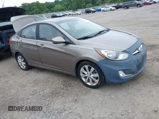2013 Hyundai Accent GLS z VIN KMHCU4AE3DU580650, wystawiony jako IAAI lot #42479723 z przebiegiem 94 416 mil mil oraz . Historia ofert i sprzedaży dostępna na DreamBid. Obrazek 1.