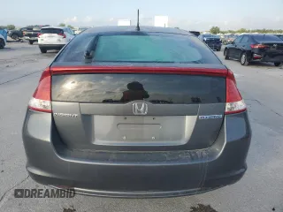 2010 Honda Insight EX with VIN JHMZE2H72AS025427, listed as a Copart auction lot 54983775 with 184,052 mi miles and Salvage Title. Bid and sale history available at DreamBid. Image 6.