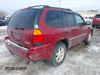2008 GMC Envoy SLE2 with VIN 1GKDT13S182132619, listed as a IAAI auction lot 41605231 with 138,458 mi miles. Bid and sale history available at carsss.com. Image 4.