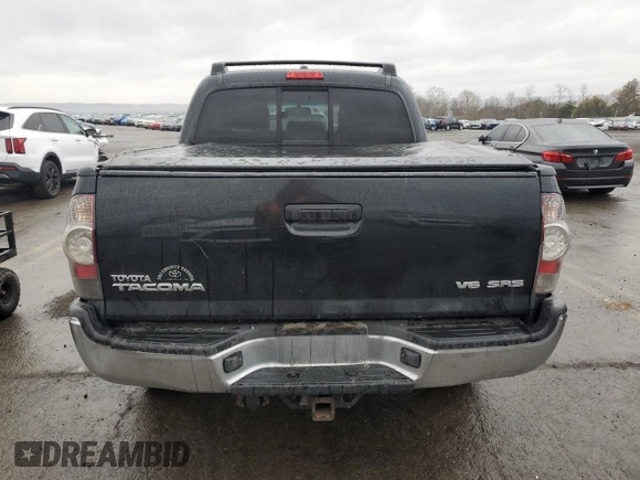 2009 Toyota Tacoma with VIN 3TMLU42N59M024127, listed as a Copart auction lot 51152195 with 213,513 mi miles and Salvage Title. Bid and sale history available at DreamBid. Image 6.