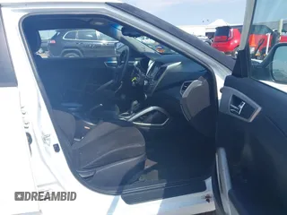 2014 Hyundai Veloster RE:FLEX z VIN KMHTC6AD5EU201168, wystawiony jako IAAI lot #41930766 z przebiegiem 198 909 mil mil oraz . Historia ofert i sprzedaży dostępna na DreamBid. Obrazek 5.