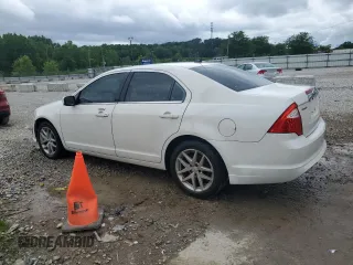 2012 Ford Fusion SEL with VIN 3FAHP0JA0CR249382, listed as a Copart auction lot 61173215 with 220,214 mi miles and Salvage title. Bid and sale history available at DreamBid. Image 2.