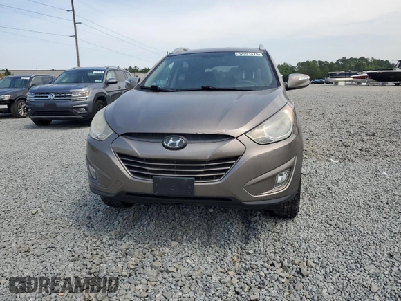 2013 Hyundai Tucson GLS with VIN KM8JU3AC4DU588322, listed as a Copart auction lot 52991475 with 174,335 mi miles and Clean Title. Bid and sale history available at carsss.com. Image 5.