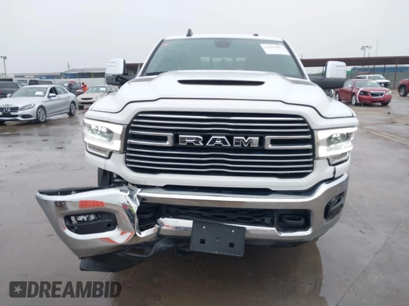 2024 Ram 2500 Laramie z VIN 3C6UR5NL7RG143695, wystawiony jako IAAI lot #41504981 z przebiegiem 6 511 mil mil oraz . Historia ofert i sprzedaży dostępna na DreamBid. Obrazek 6.