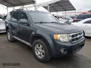 2009 Ford Escape Limited with VIN 1FMCU04759KB64236, listed as a IAAI auction lot 41796461 with 214,949 mi miles. Bid and sale history available at carsss.com. Image 1.