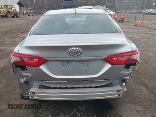 2019 Toyota Camry LE z VIN 4T1B11HK9KU851075, wystawiony jako IAAI lot #41911090 z przebiegiem 114 762 mil mil oraz . Historia ofert i sprzedaży dostępna na DreamBid. Obrazek 16.