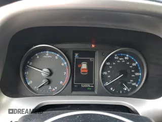 2018 Toyota RAV4 XLE with VIN JTMRFREV2JJ215776, listed as a Copart auction lot 51745205 with 52,009 mi miles and Salvage Title. Bid and sale history available at DreamBid. Image 9.