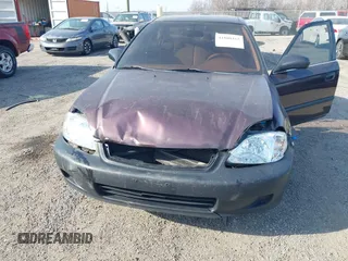 2000 Honda Civic LX with VIN 2HGEJ6675YH528894, listed as a IAAI auction lot 41800415 with 444,713 mi miles. Bid and sale history available at carsss.com. Image 6.